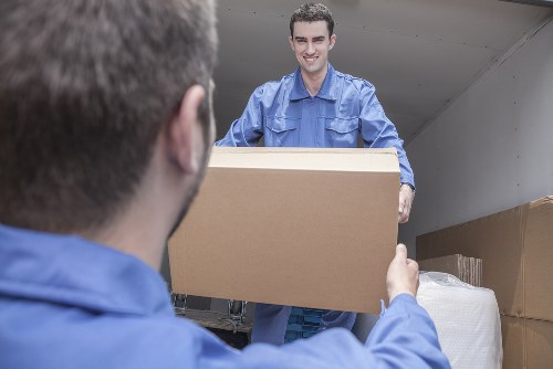 Removal team helping with a move in Kensington