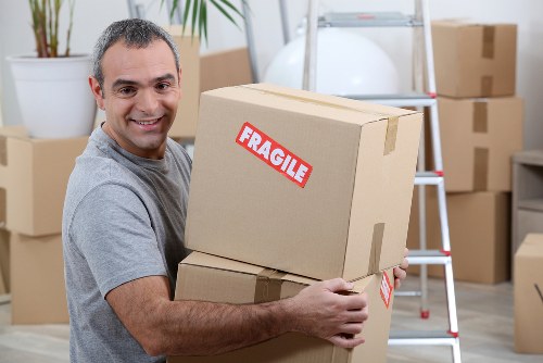 Office relocation planning in Kensington with desks and boxes prepared for move day