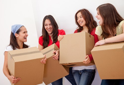 Packed boxes and furniture ready for a Kensington home removal