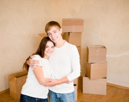 Professional movers discussing a property risk assessment