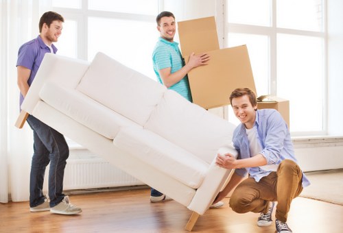 Professional movers loading furniture for a Kensington relocation