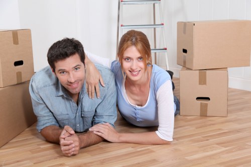 Packed moving boxes and furniture for a Kensington property move