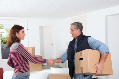 Packing materials and labelled boxes prepared for a move in Kensington