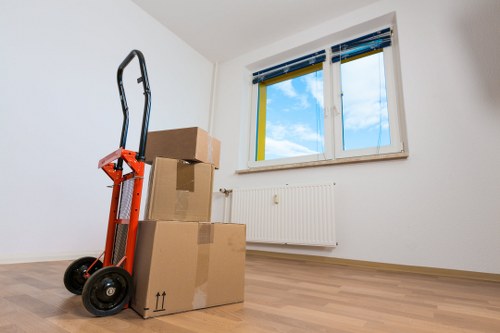 Removal crew loading furniture safely into a van