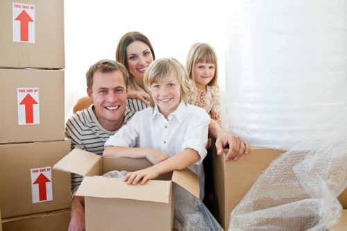 Local movers loading furniture for a Kensington property move