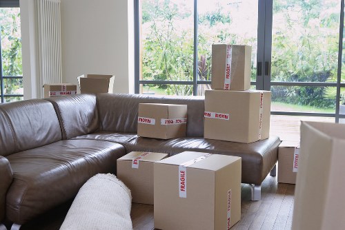Professional movers handling furniture during a Kensington move