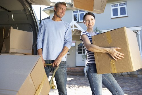 Local movers transporting household boxes in Kensington